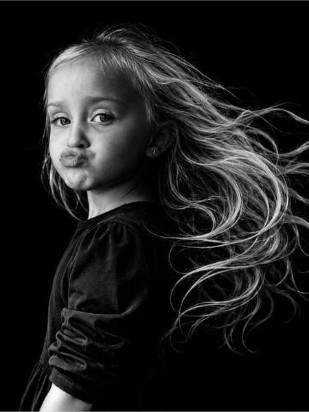 black and white photo of a girl with long hair