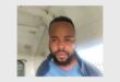 face of suspect in a police van
