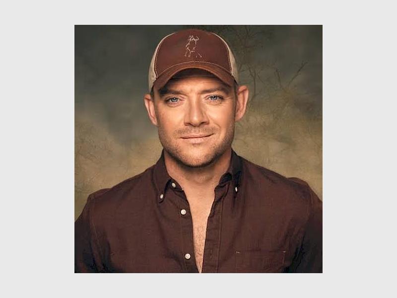 good looking man with a cap on his head