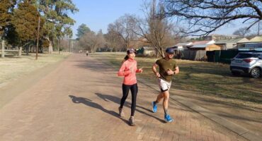 a couple jog together
