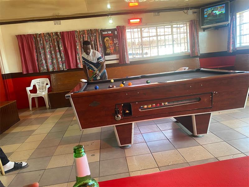 a man playing pool