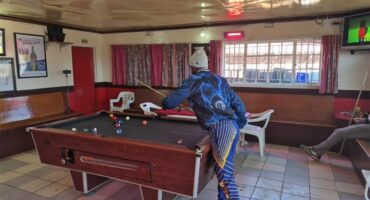 a man playing pool