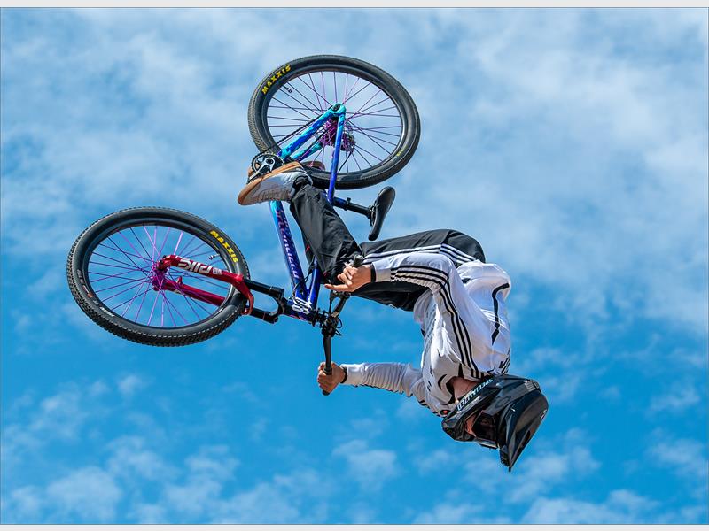A cyclist doing flips