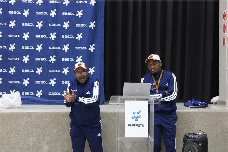 Doctor Thwala and July Mavuso, the Sasol Marathon club leaders presenting the club performance analysis during a photo shoot. Photo: Mphikeleli Masangu