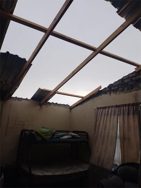 house of which the roof had blown off