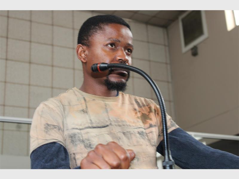man in the dock of the court