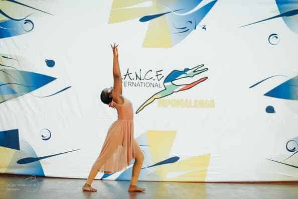 a modern dancer in soft pink