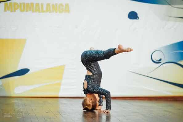 girl standing on her head