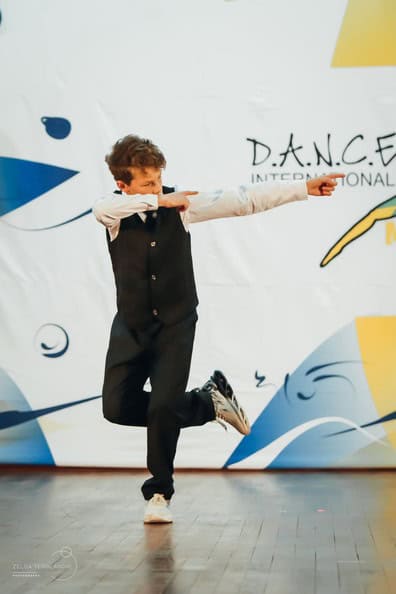 a boy dances hip hop