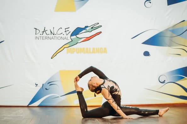 a girl doing an acrobatic move
