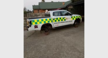 an emergency vehicle on bricks