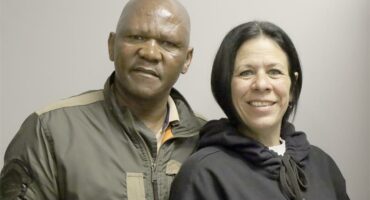 a man and a woman in a work setting