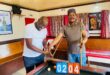 Two men at a pool table