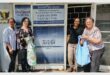 four women in front of the window of tutela offices
