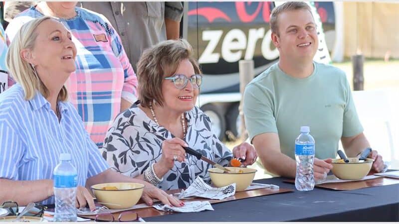 Three people tasting food