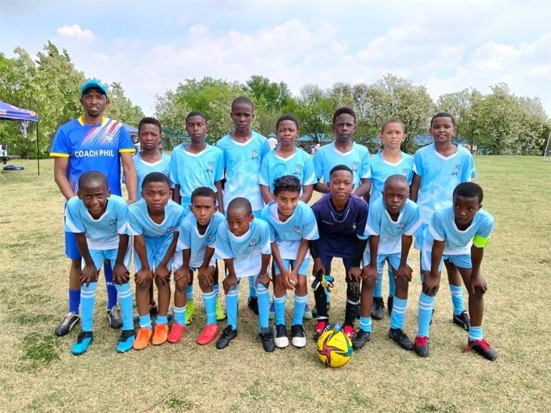 a soccer team in light blue kit