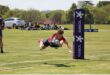 rugby player dives over score line