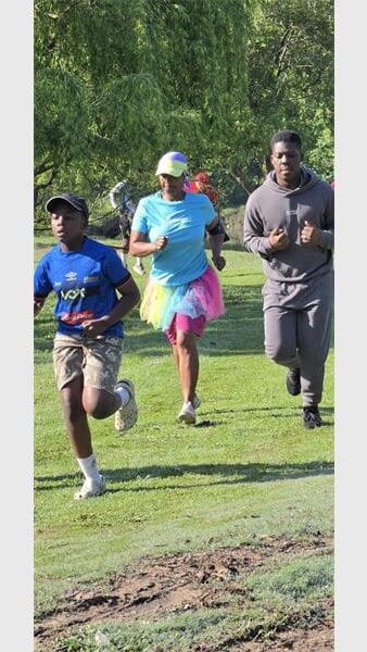 people running the park