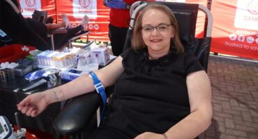 woman donates blood