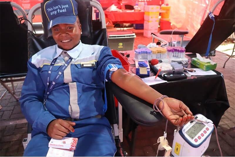 woman donates blood