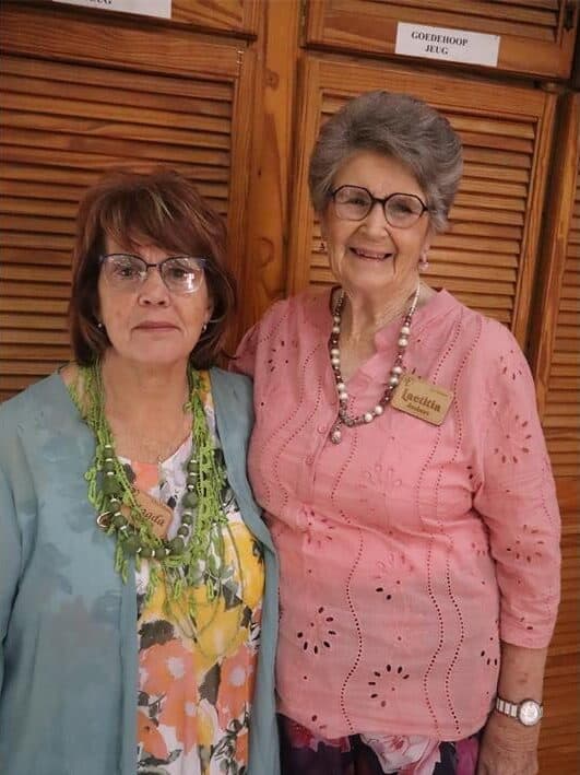 two elderly women dressed up