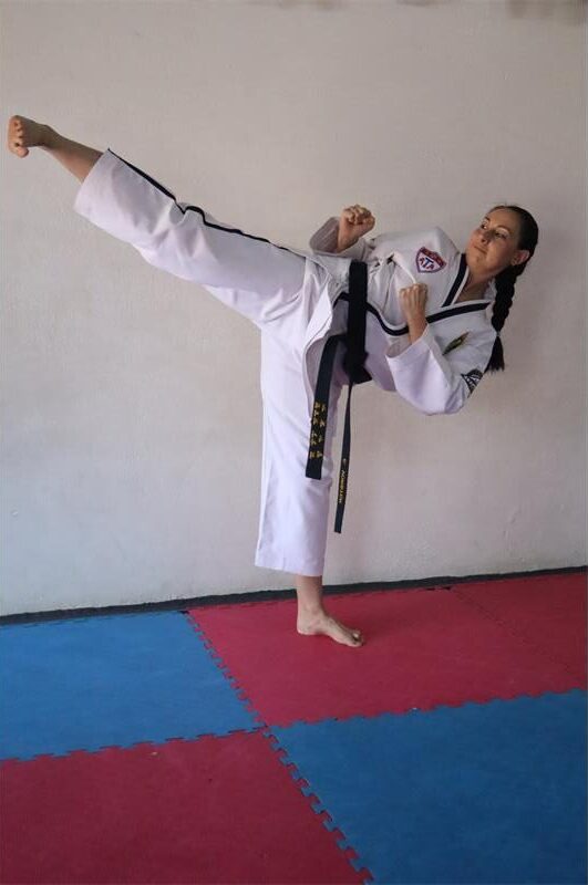 Woman in taekwondo suit