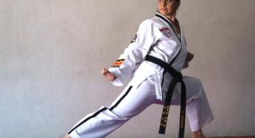 Woman in taekwondo suit