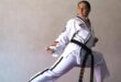 Woman in taekwondo suit