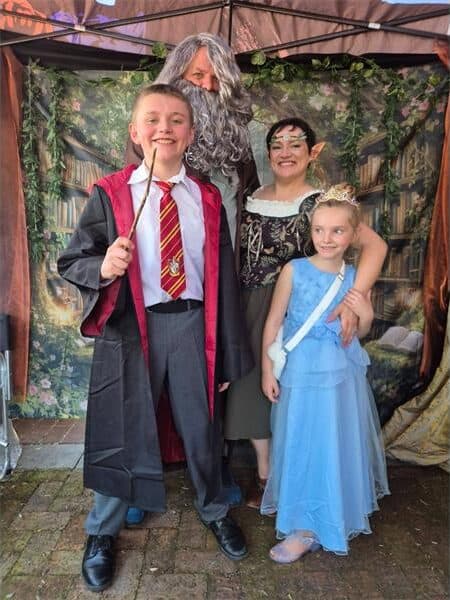 family dressed up in fantasy outfits