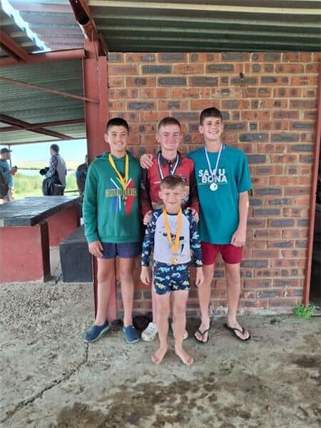 four children with medals