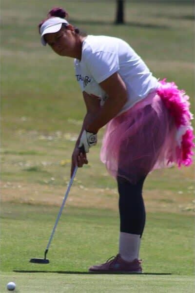 Woman with a pink tutu puts