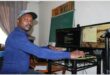 a man working on a computer