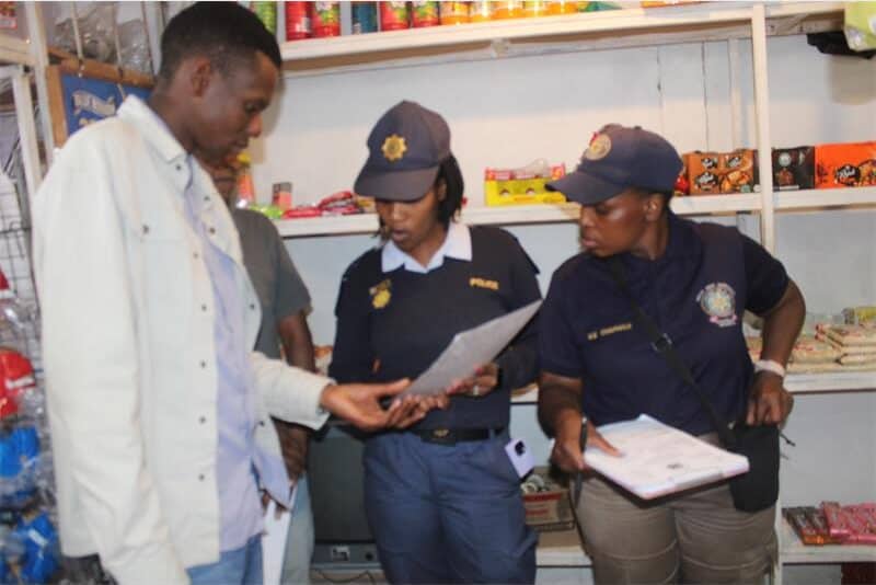 law enforcement close down a tuck shop
