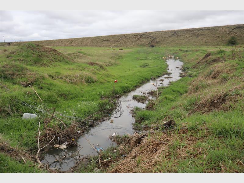 sewage flowing in trench