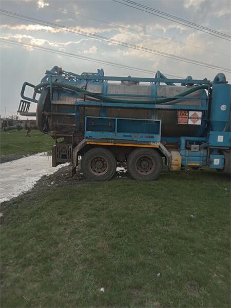 a honey sucker truck after it dumped waste into a stream