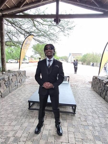 young man is dressed up